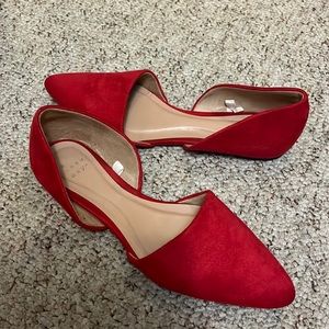 Red pointy flats
